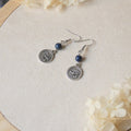 Boucles d’oreilles pendantes lapis lazuli et oeil d’Horus