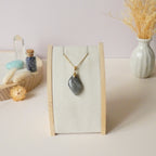 Pendentif en labradorite violet orange 2,9 cm bélière dorée