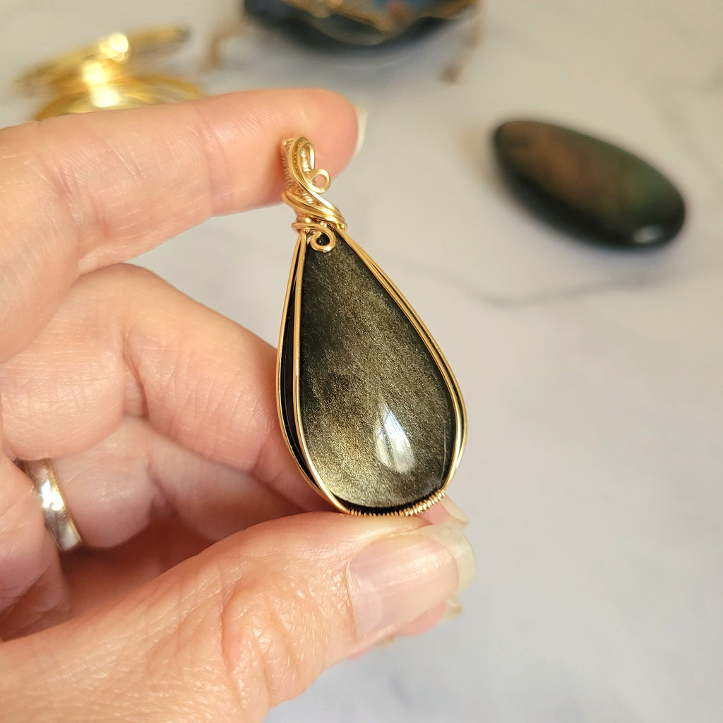 Pendentif obsidienne dorée 5,1 cm wire wrapping doré