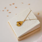 Pendentif en ambre – 2,7 cm – Wire wrapping doré