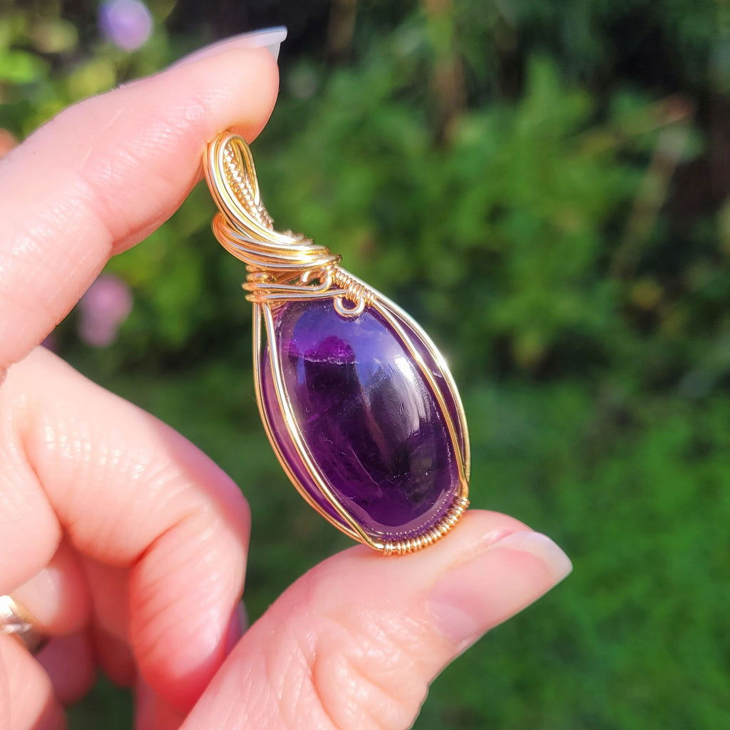 Pendentif en améthyste - wire wrapping doré - pierre naturelle