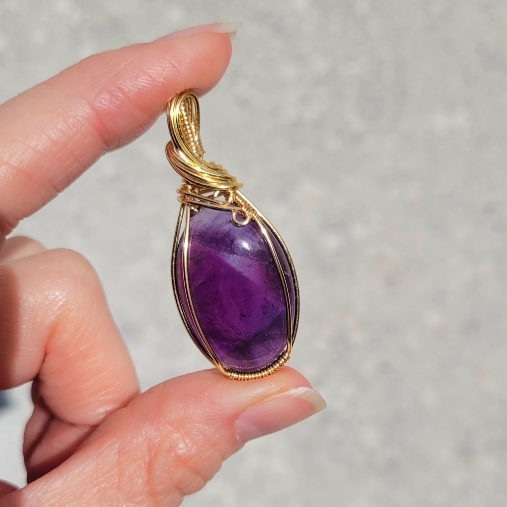 Pendentif en améthyste - wire wrapping doré - pierre naturelle