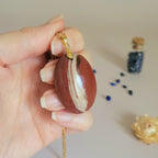 Pendentif bois fossile 3,8 cm Madagascar