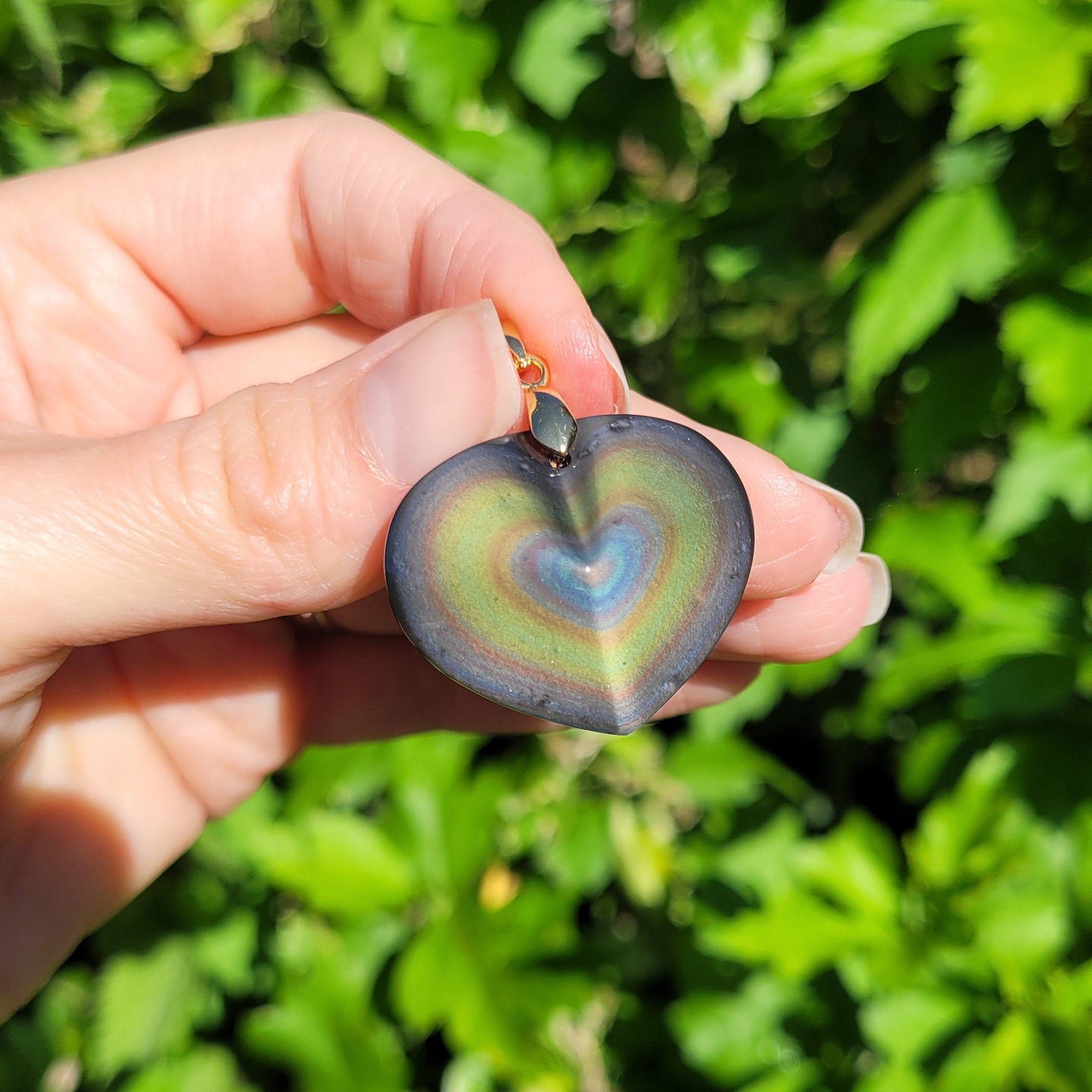 Pendentif coeur en obsidienne oeil céleste 2,4 cm bélière dorée