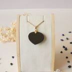 Pendentif coeur en obsidienne oeil céleste 2,4 cm bélière dorée