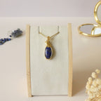 Pendentif en lapis lazuli d'Afghanistan – bijou artisanal en pierre naturelle – wire wrapping doré
