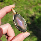 Grand pendentif obsidienne oeil céleste 6,2 cm wire wrapping doré