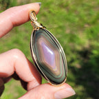 Grand pendentif obsidienne oeil céleste 6,2 cm wire wrapping doré