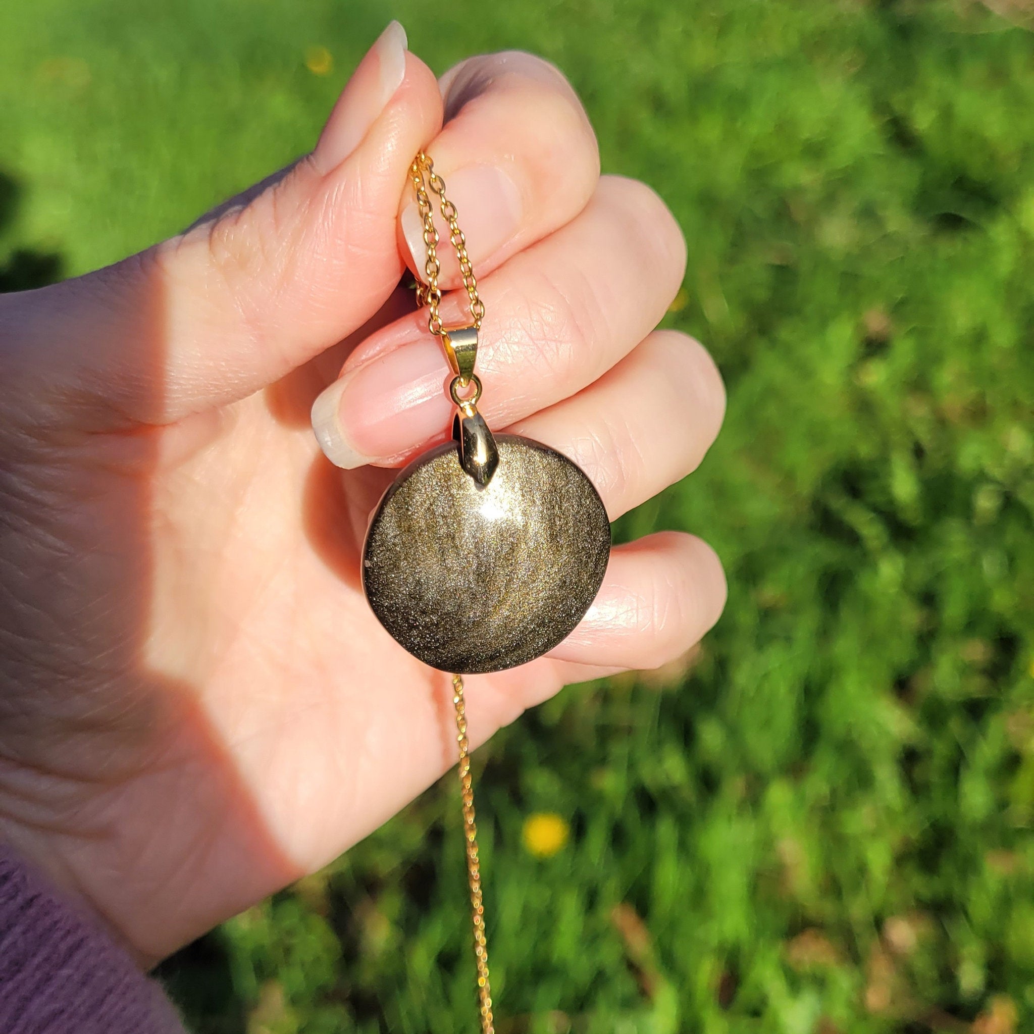 Pendentif obsidienne dorée 2,7 cm bélière dorée