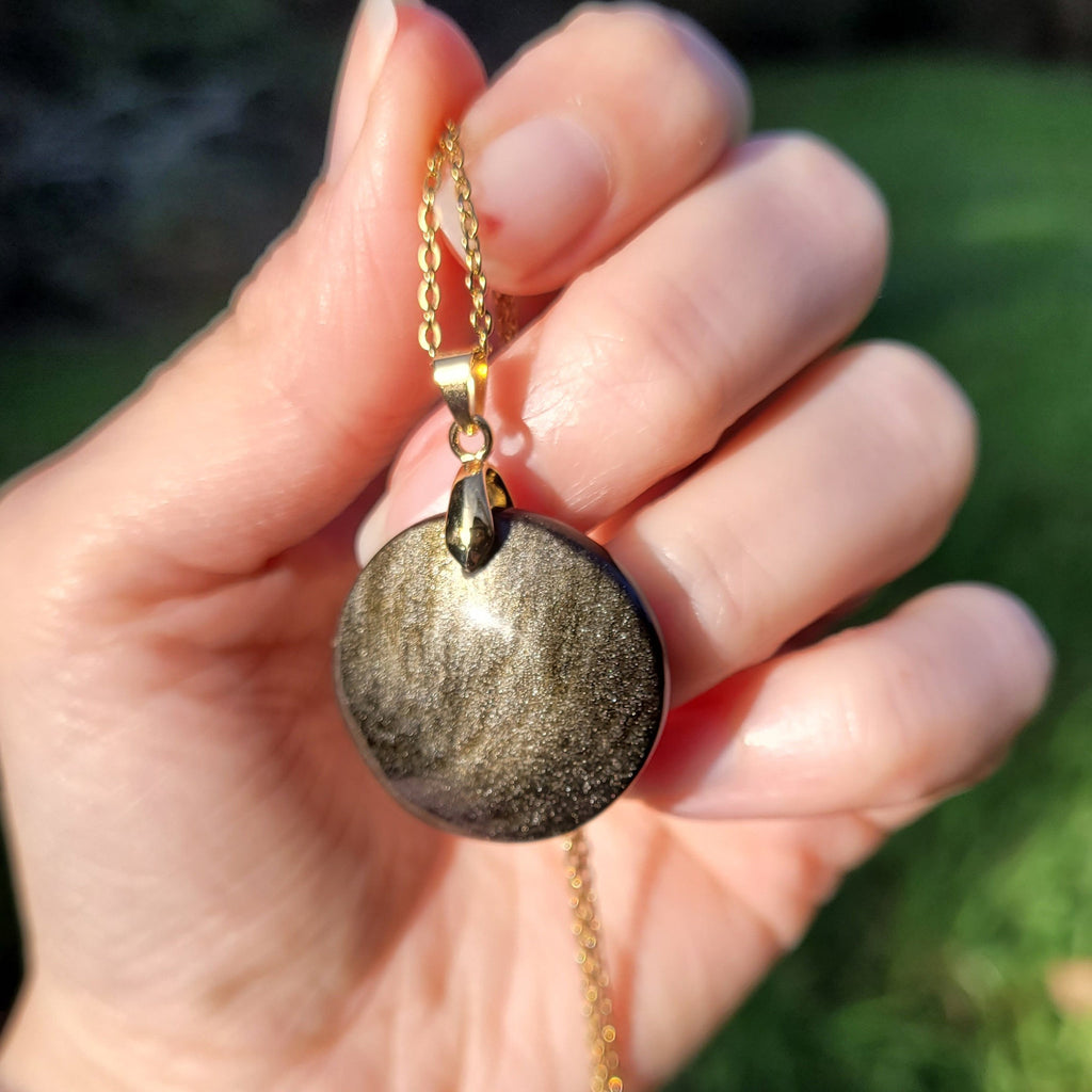 Pendentif obsidienne dorée 2,7 cm bélière dorée