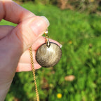 Pendentif obsidienne dorée 2,7 cm bélière dorée