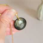 Pendentif obsidienne dorée 2,7 cm bélière dorée