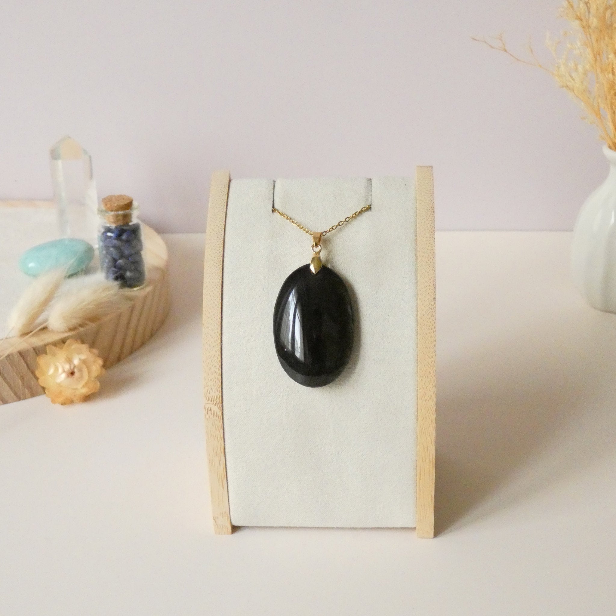 Pendentif obsidienne dorée 4,1 cm bélière dorée