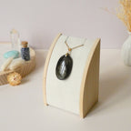 Pendentif obsidienne dorée 4,1 cm bélière dorée