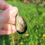 Pendentif obsidienne dorée 4,3 cm bélière dorée
