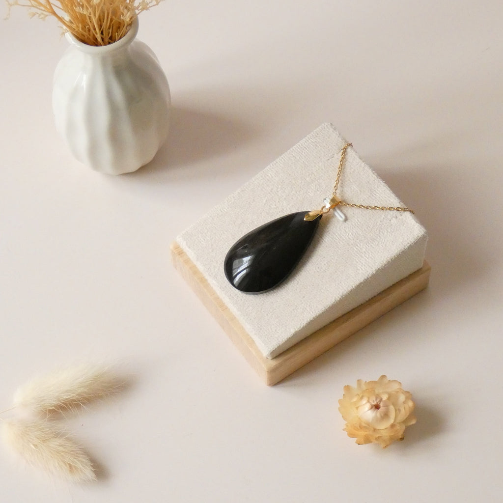 Pendentif obsidienne dorée 4,3 cm bélière dorée