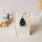 Pendentif obsidienne dorée 4,3 cm bélière dorée