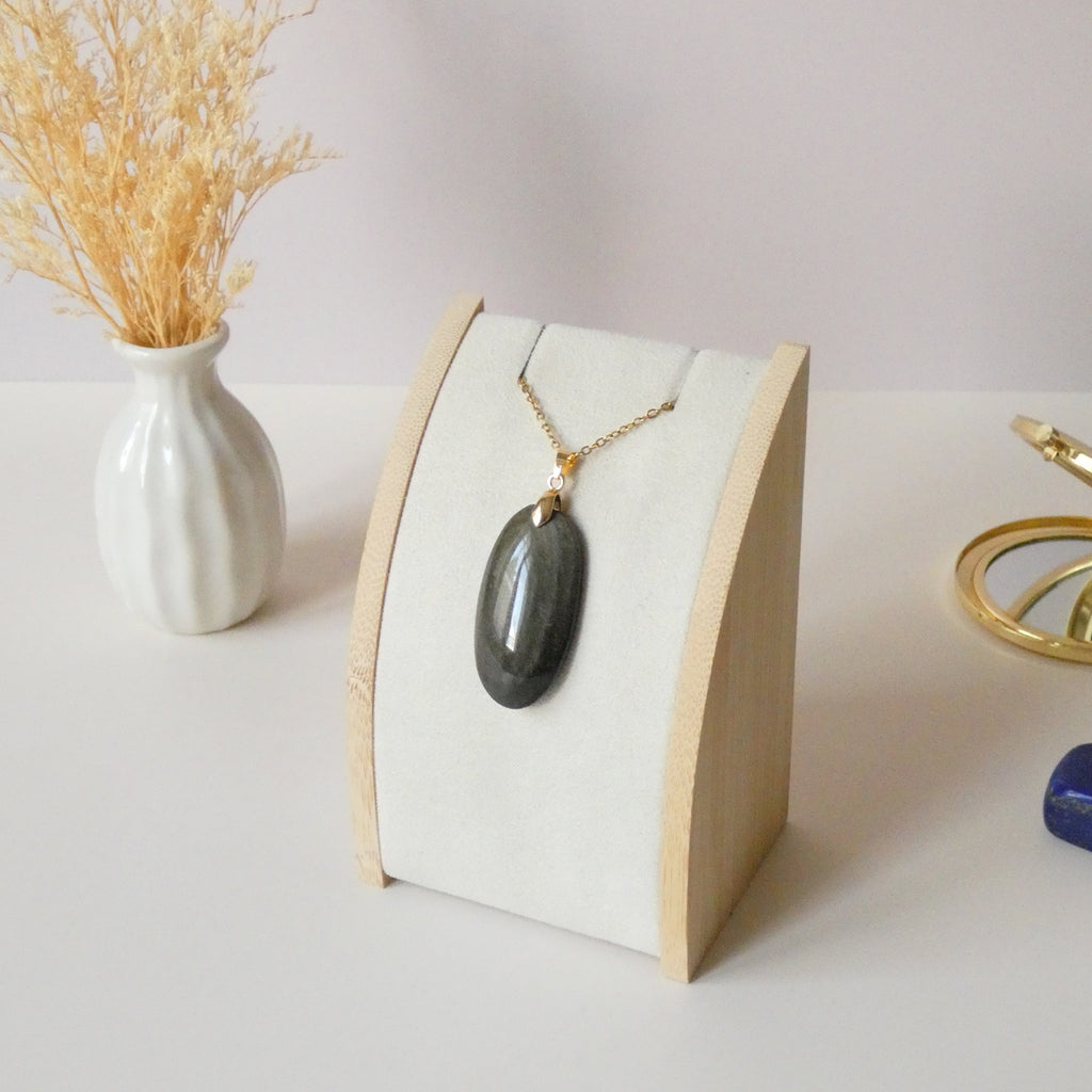 Pendentif obsidienne dorée 3,9 cm bélière dorée