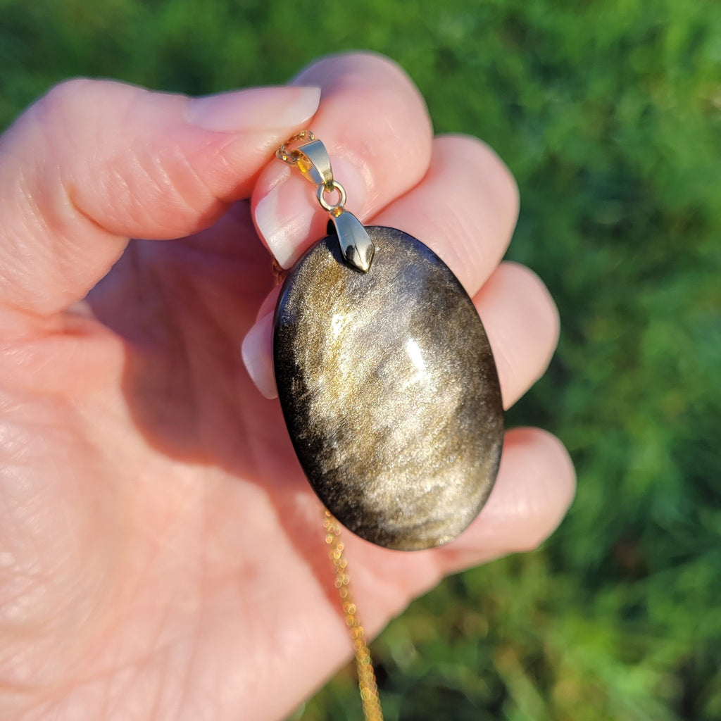 Pendentif obsidienne dorée 4 cm bélière dorée