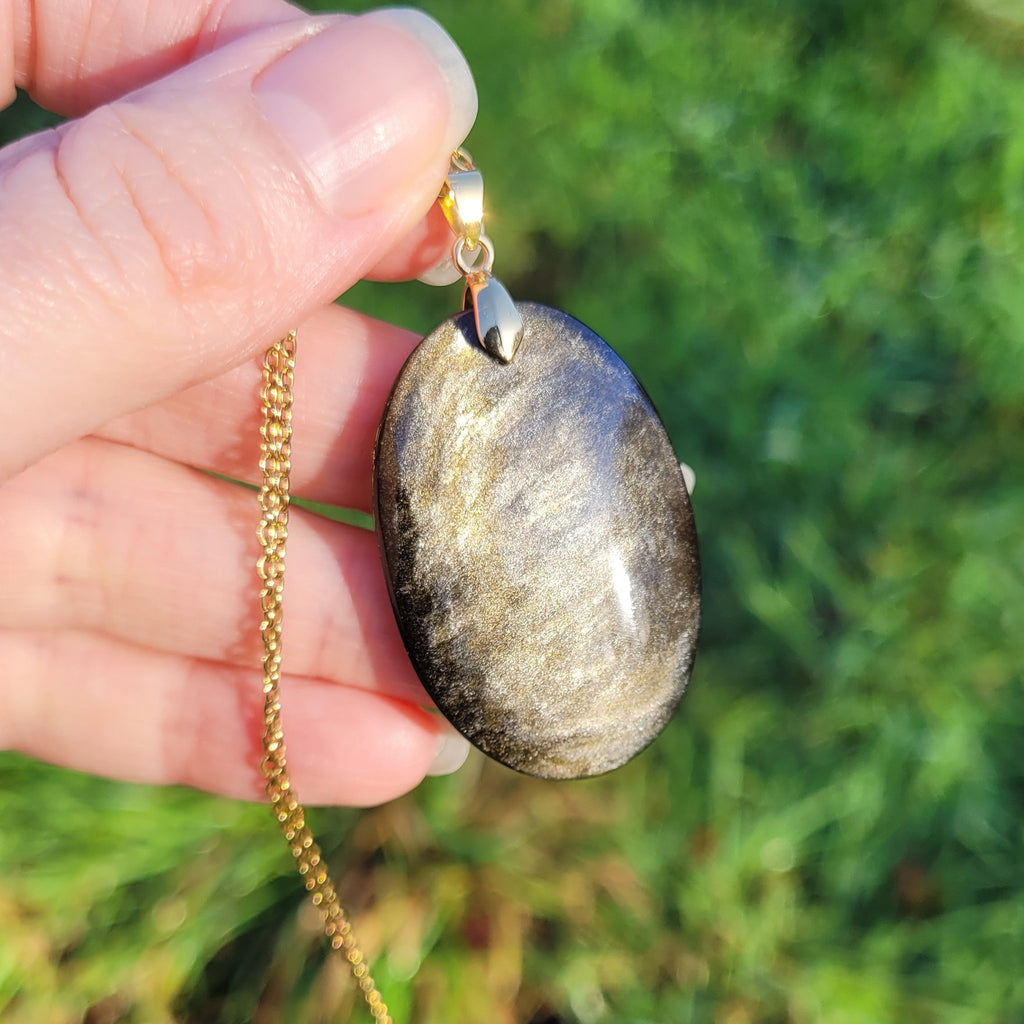 Pendentif obsidienne dorée 4 cm bélière dorée