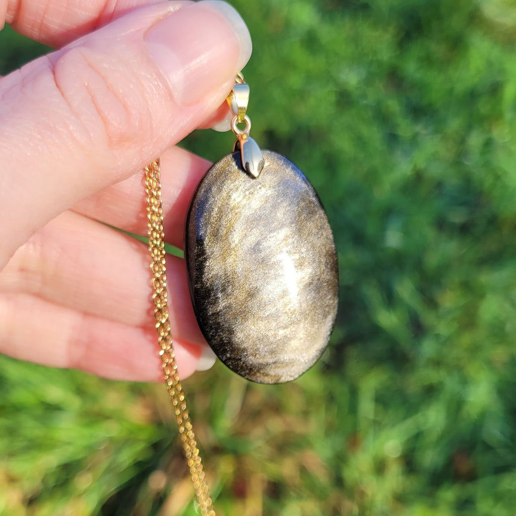 Pendentif obsidienne dorée 4 cm bélière dorée