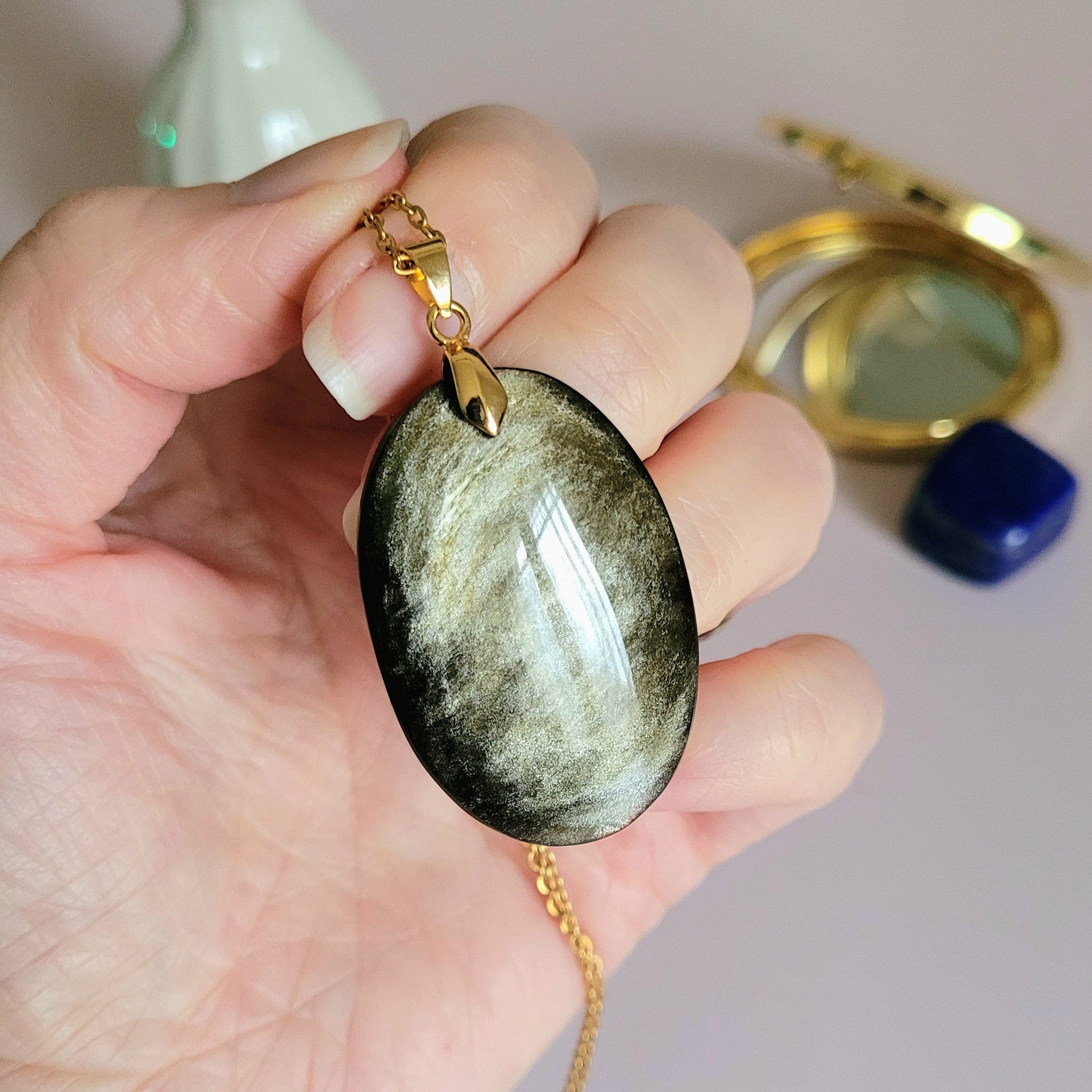 Pendentif obsidienne dorée 4 cm bélière dorée