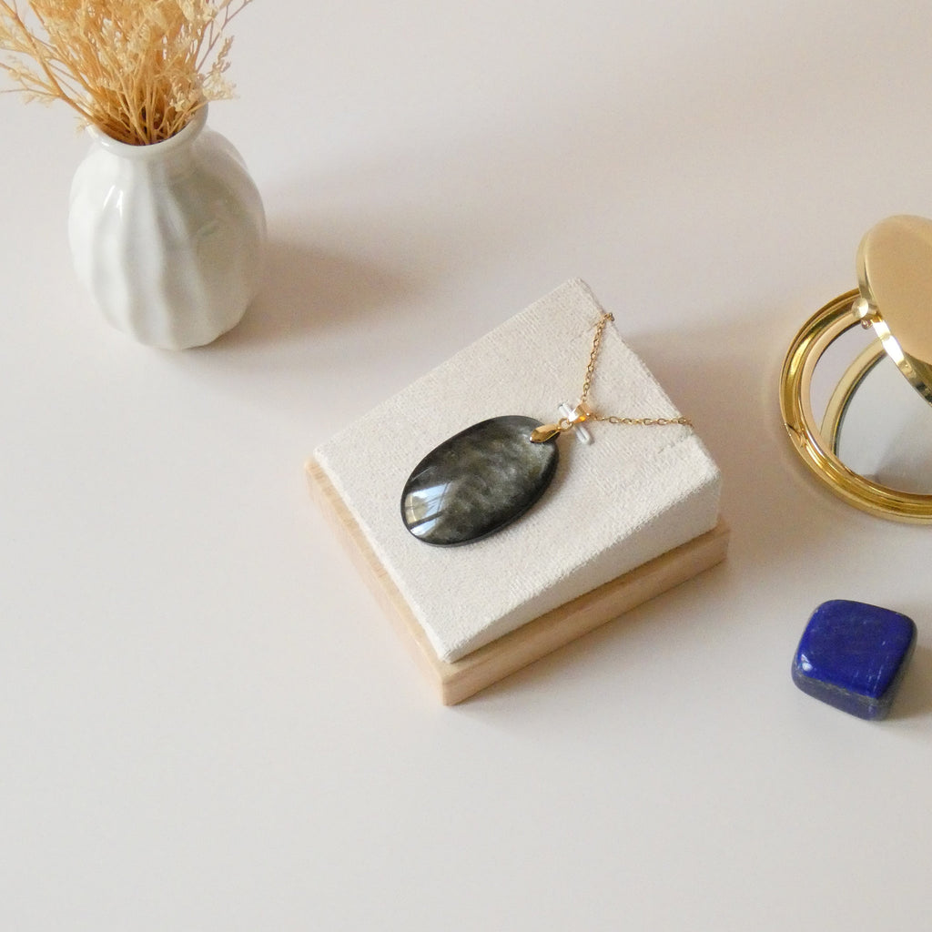 Pendentif obsidienne dorée 4 cm bélière dorée