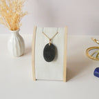 Pendentif obsidienne dorée 4 cm bélière dorée