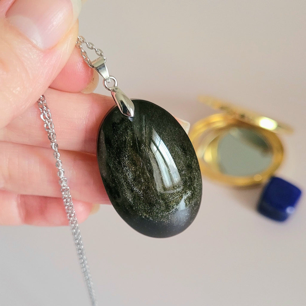 Pendentif obsidienne dorée 4 cm bélière argentée