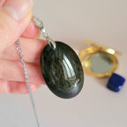 Pendentif obsidienne dorée 4 cm bélière argentée