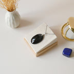 Pendentif obsidienne dorée 4 cm bélière argentée