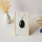 Pendentif obsidienne dorée 4 cm bélière argentée