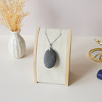 Pendentif obsidienne dorée 4 cm bélière argentée