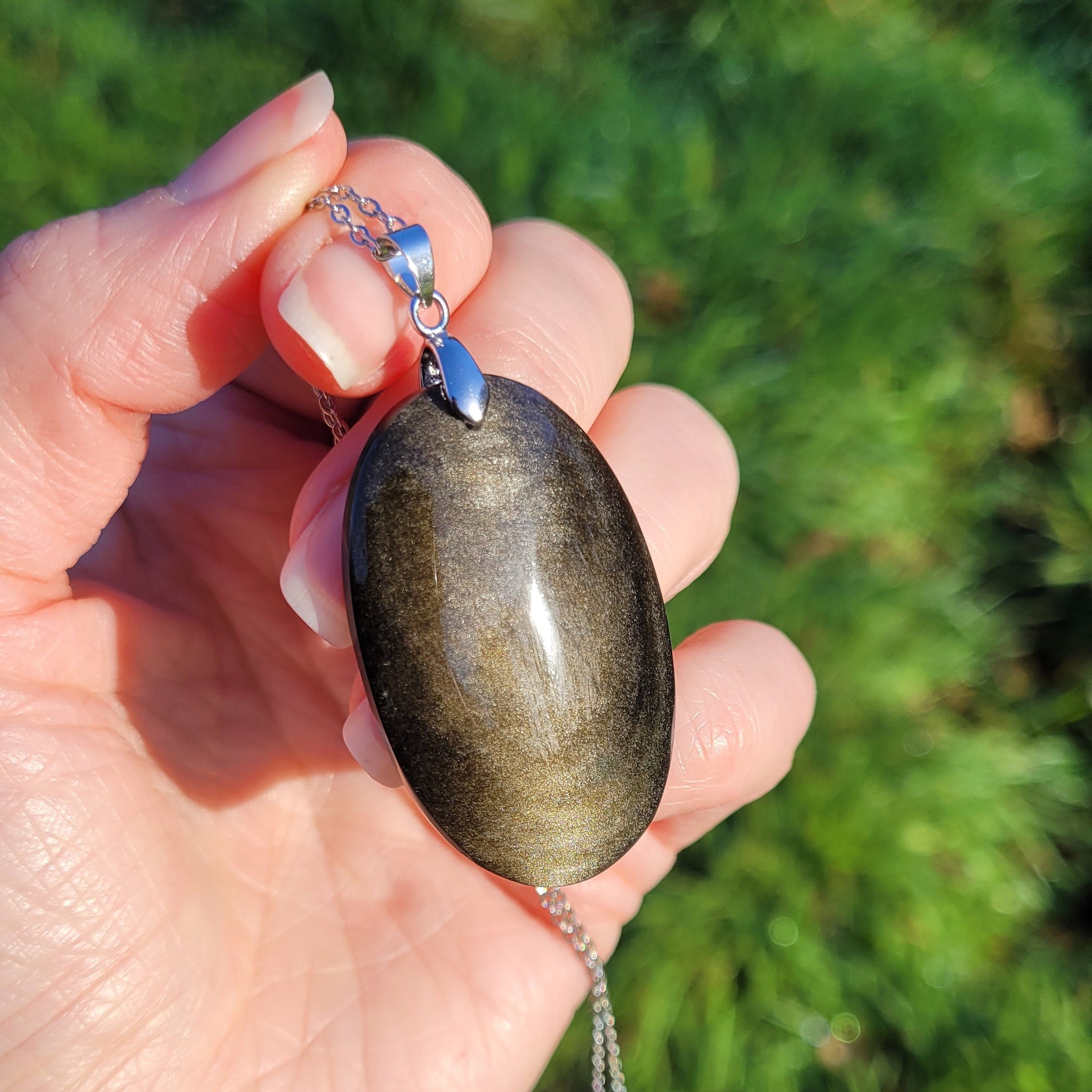 Pendentif en obsidienne dorée 4,3 cm bélière argentée