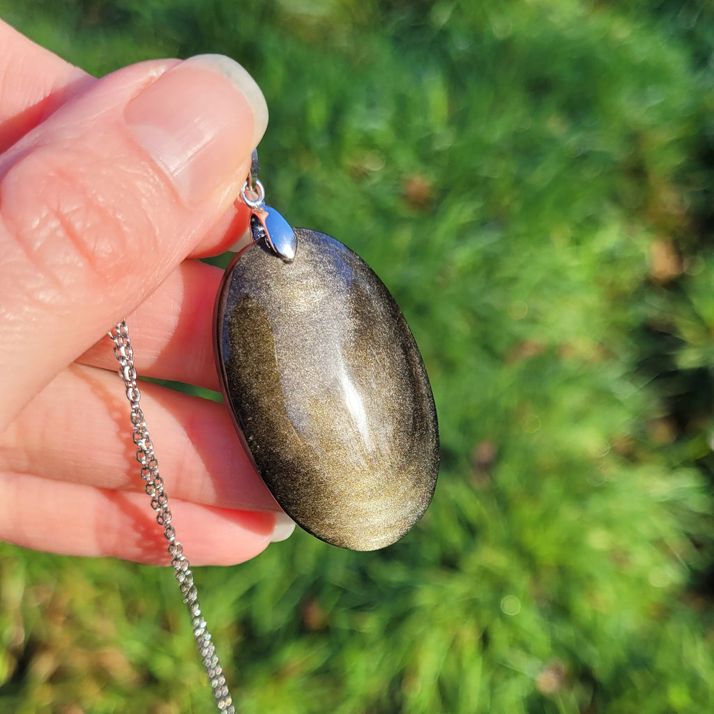 Pendentif en obsidienne dorée 4,3 cm bélière argentée