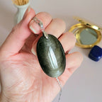 Pendentif en obsidienne dorée 4,3 cm bélière argentée