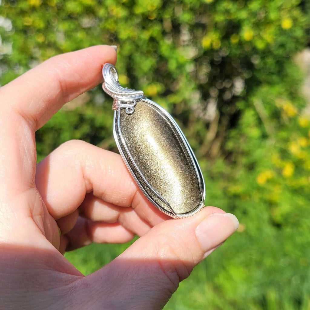 Pendentif obsidienne dorée 6,2 cm wire wrapping argenté