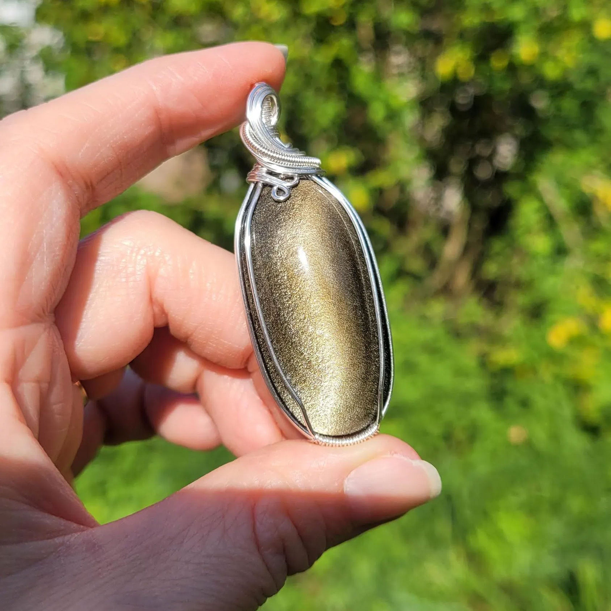 Pendentif obsidienne dorée 6,2 cm wire wrapping argenté