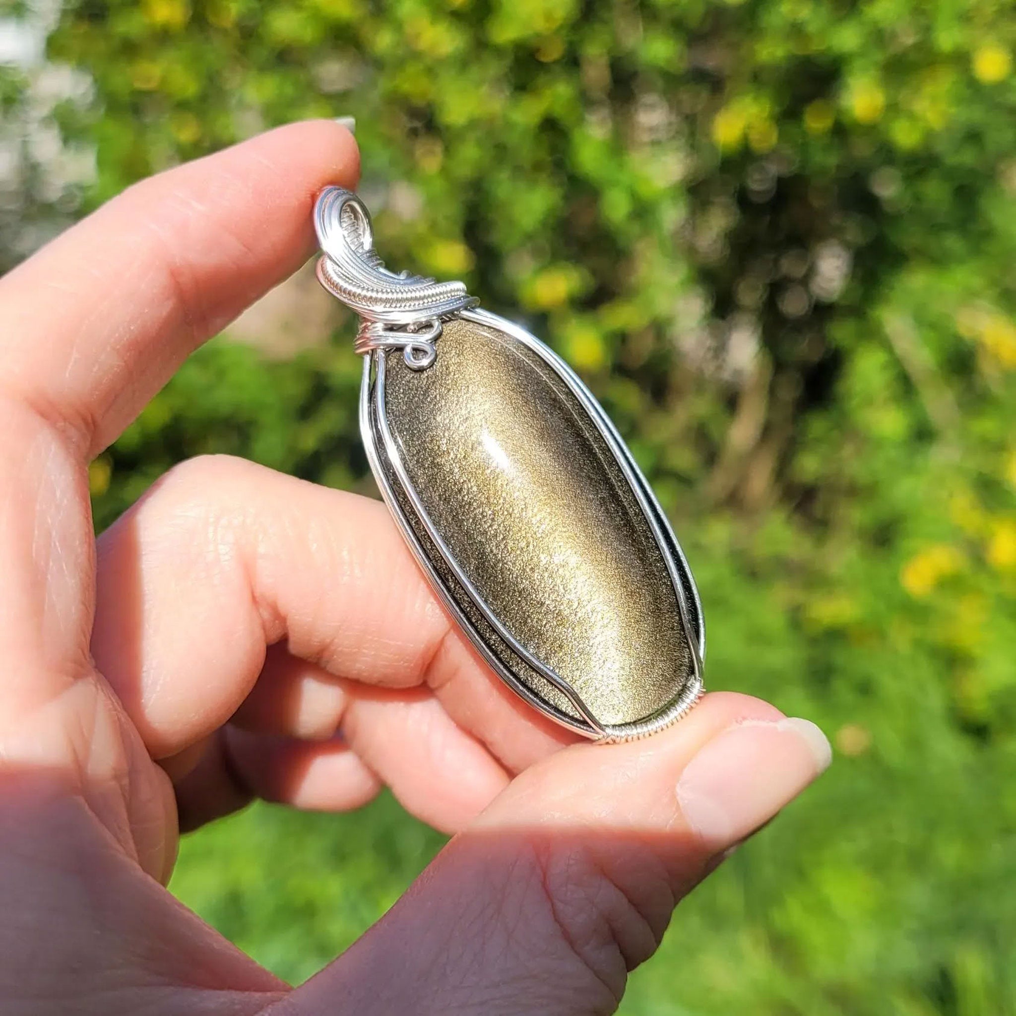 Pendentif obsidienne dorée 6,2 cm wire wrapping argenté