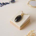 Pendentif obsidienne dorée 6,2 cm wire wrapping doré