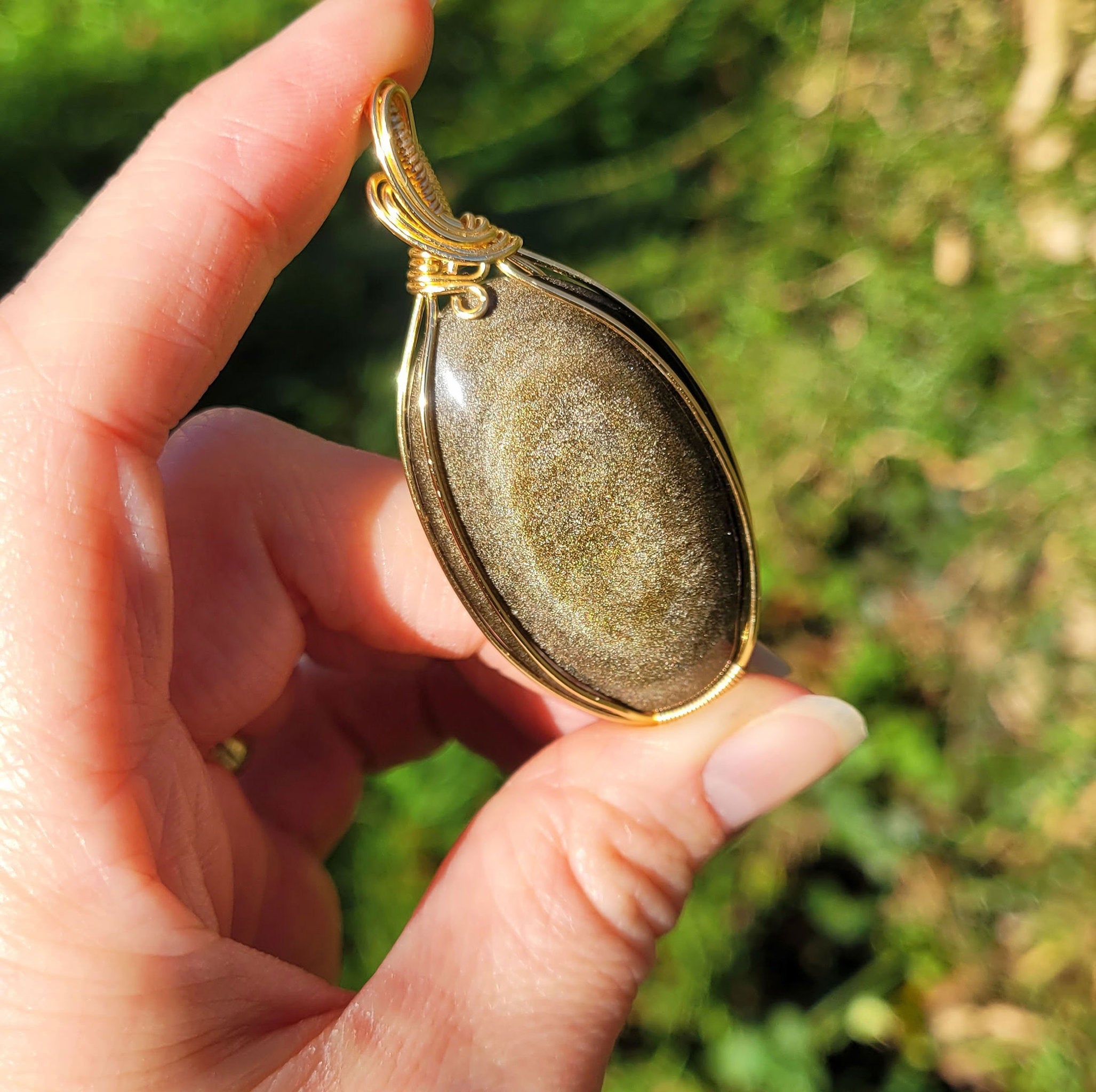 Pendentif obsidienne dorée 6,2 cm wire wrapping doré