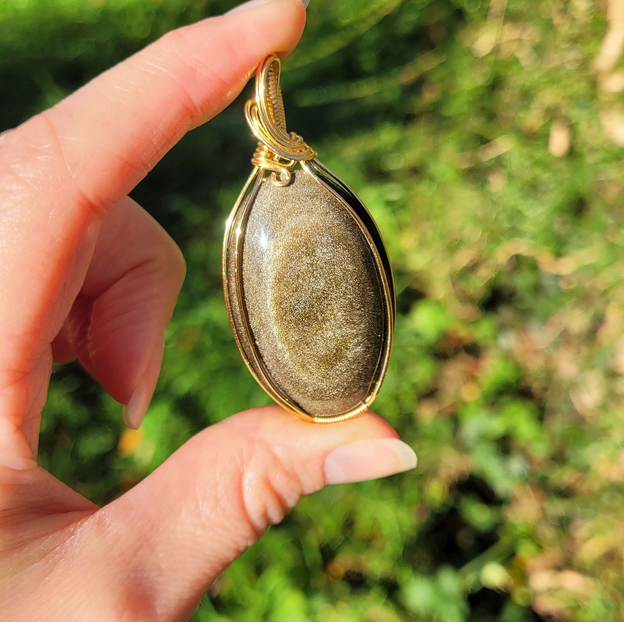 Pendentif obsidienne dorée 6,2 cm wire wrapping doré