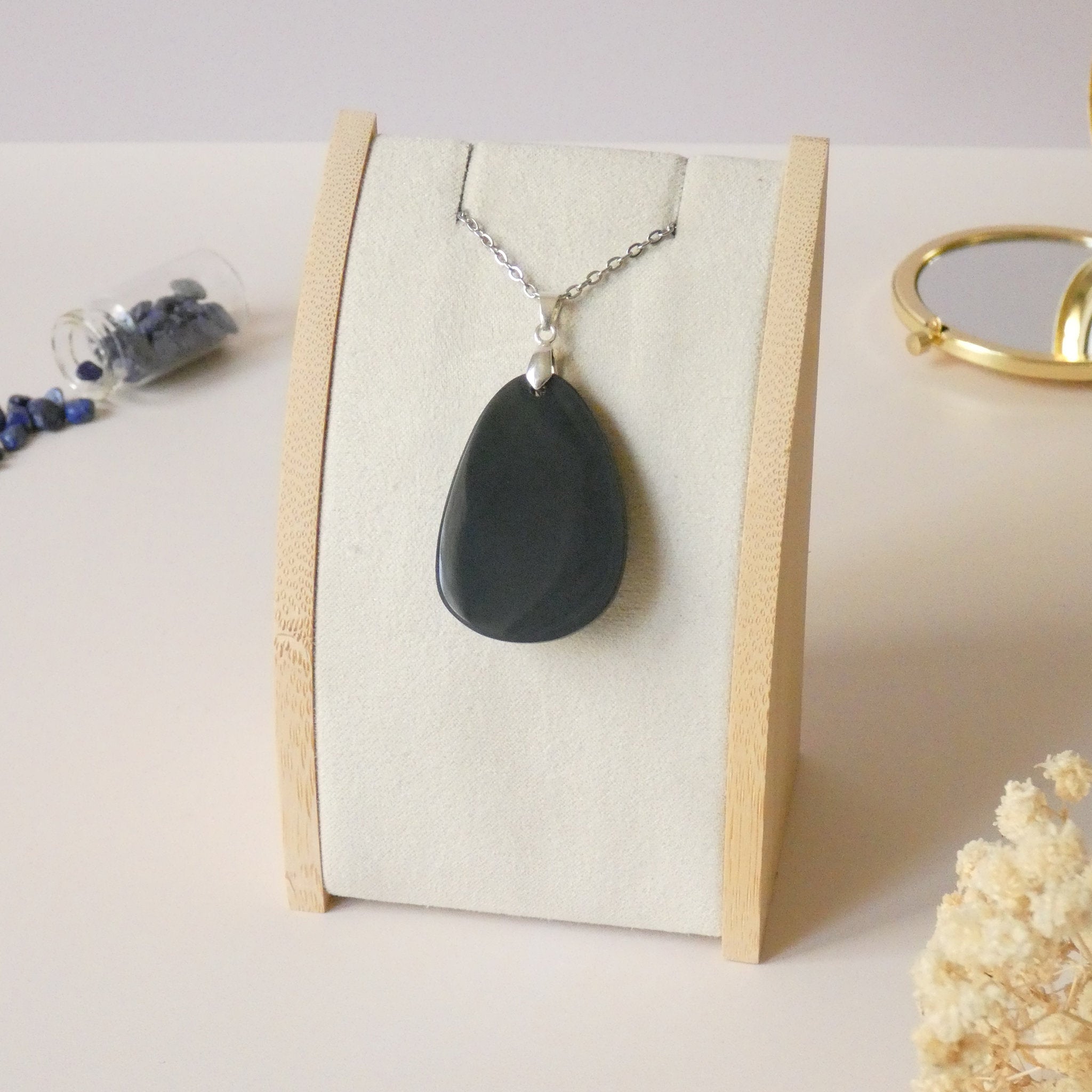 Pendentif obsidienne manta huichol 4 cm bélière argentée