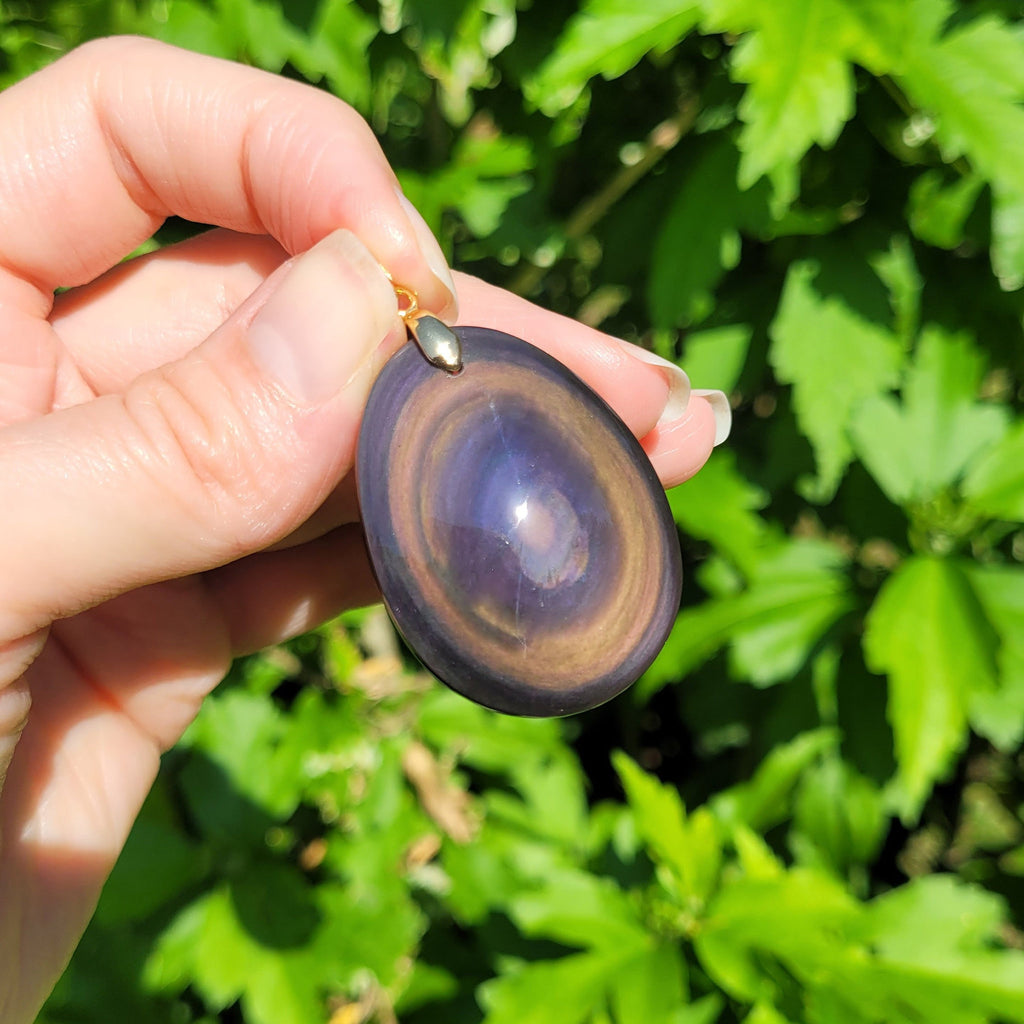 Pendentif en obsidienne oeil céleste 4 cm bélière dorée