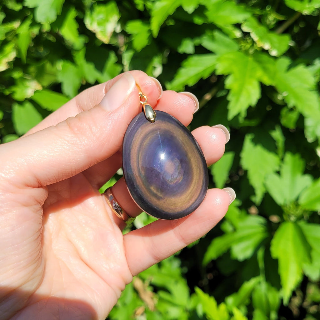 Pendentif en obsidienne oeil céleste 4 cm bélière dorée
