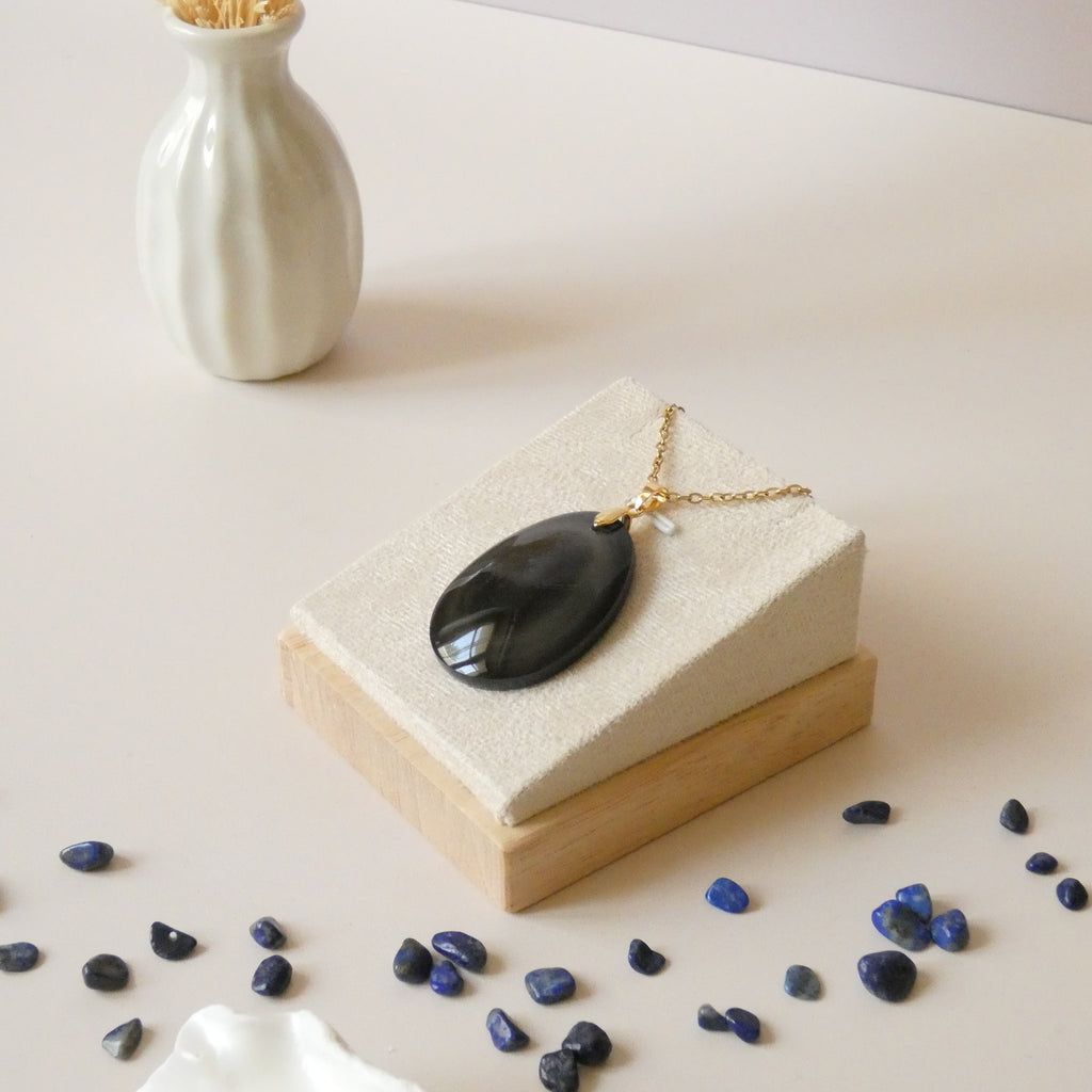 Pendentif en obsidienne oeil céleste 4 cm bélière dorée