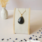 Pendentif en obsidienne oeil céleste 3,6 cm bélière dorée