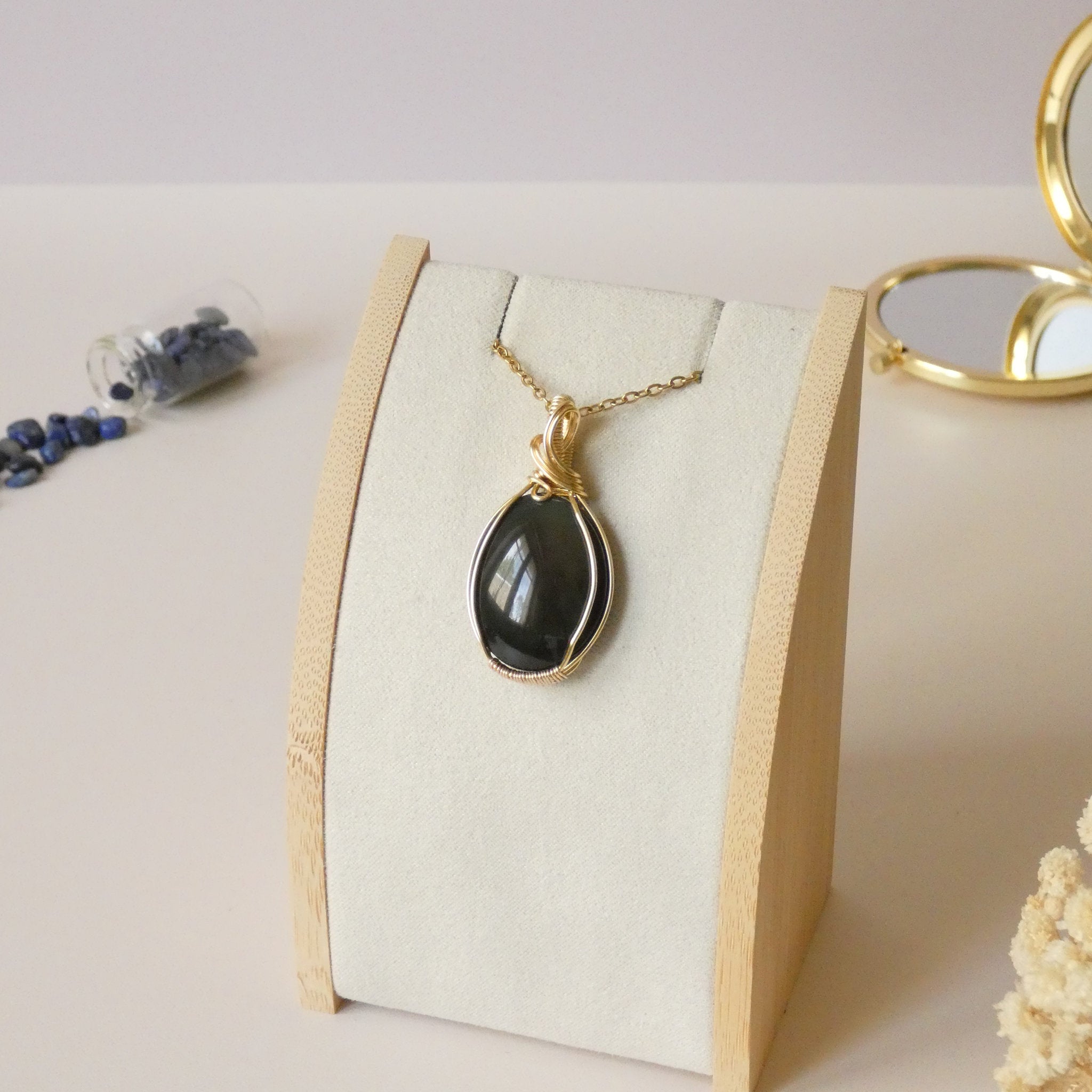 Pendentif obsidienne oeil céleste 4,4 cm wire wrapping doré