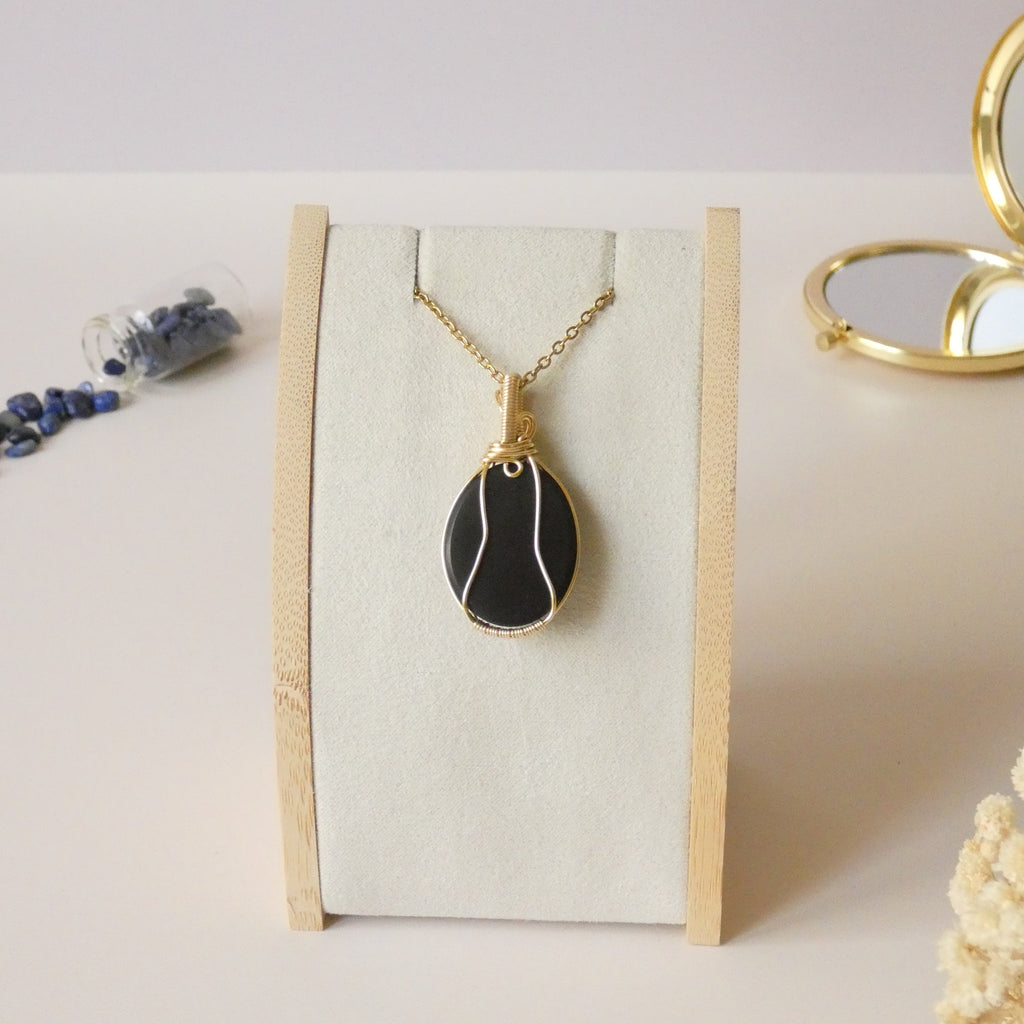 Pendentif obsidienne oeil céleste 4,4 cm wire wrapping doré
