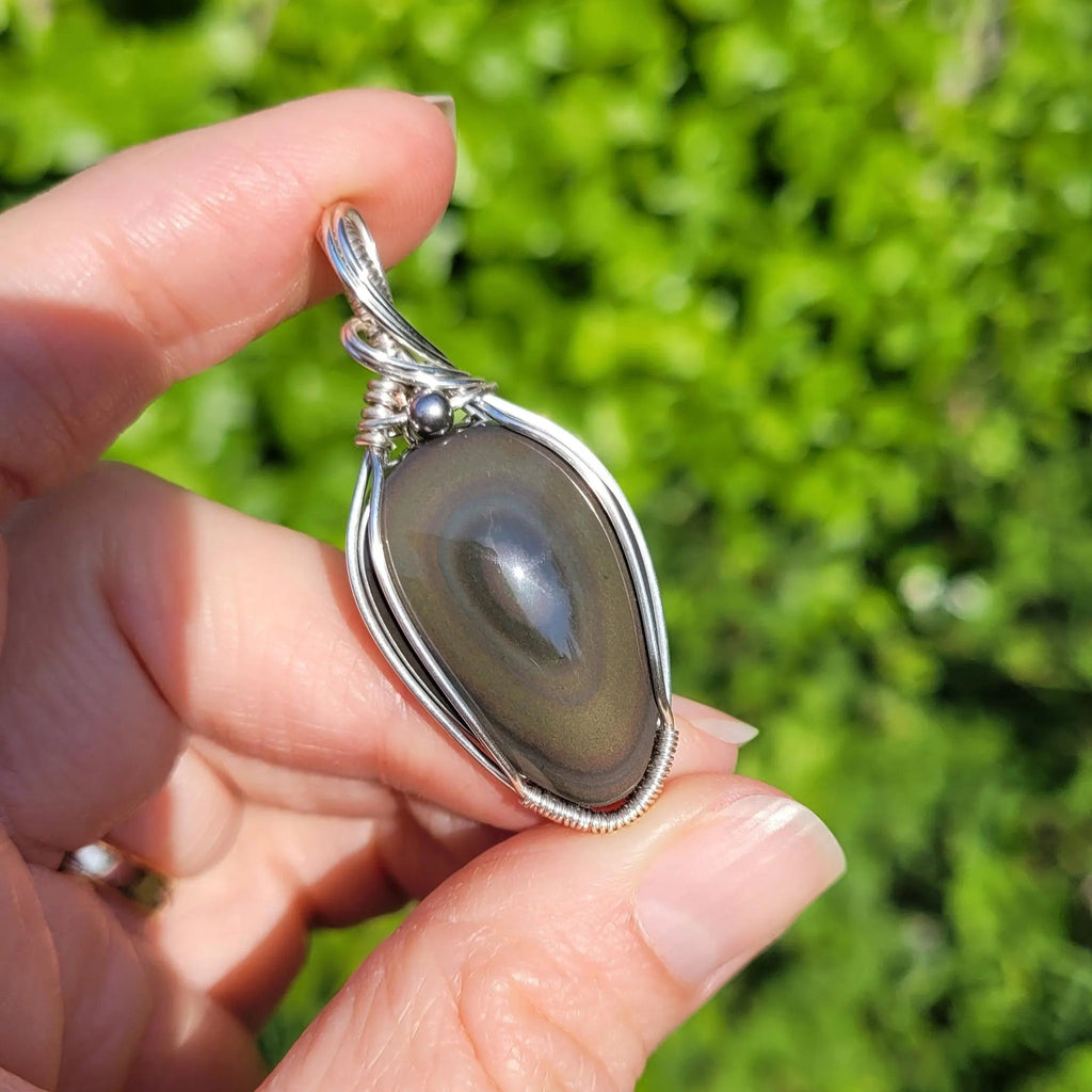Pendentif obsidienne oeil céleste 4,8 cm wire wrapping argenté